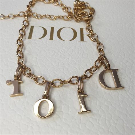 dior revolution necklace price|dior letters necklace value.